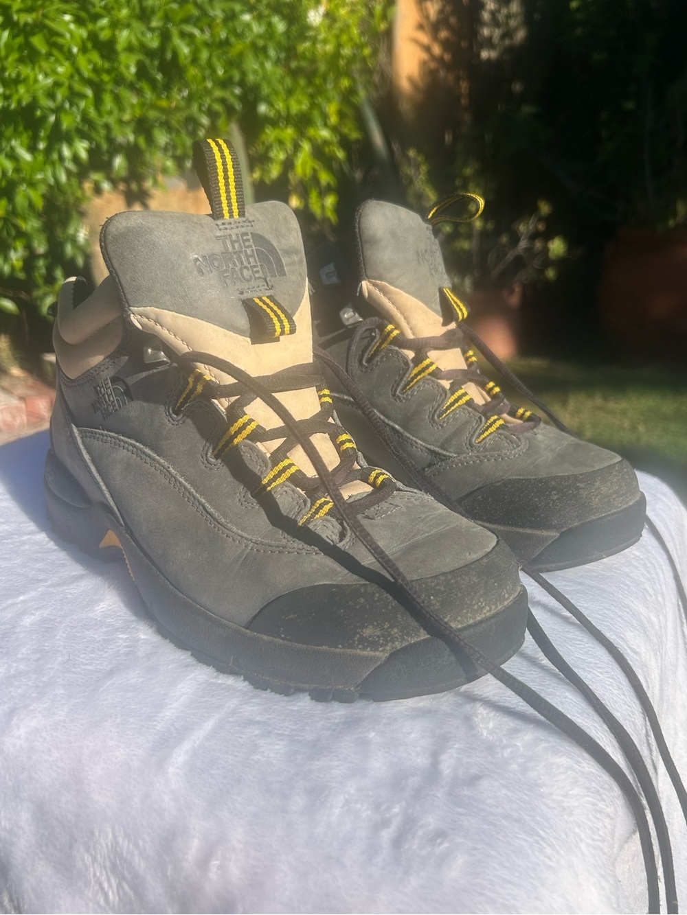 The North Face women’s 9.5  Gray Suede Hiking Sneakers with Yellow Accents